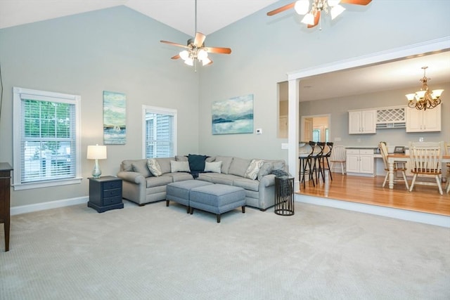 17 Stable Way, Medway, MA 02053 - living area with ceiling fan, light colored carpet, a chandelier, and high vaulted ceiling