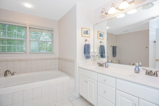 17 Stable Way, Medway, MA 02053 - bathroom with double vanity, a garden tub, tile patterned floors, and toilet