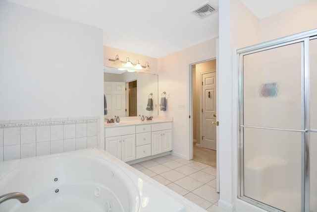 17 Stable Way, Medway, MA 02053 - bathroom featuring double vanity, a tub with jets, tile patterned floors, a stall shower, and baseboards