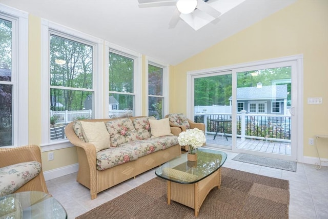 17 Stable Way, Medway, MA 02053 - living room with tile patterned flooring, a ceiling fan, baseboards, and vaulted ceiling