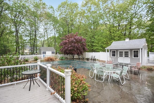 17 Stable Way, Medway, MA 02053 - view of swimming pool featuring a fenced backyard, an outdoor structure, and a patio