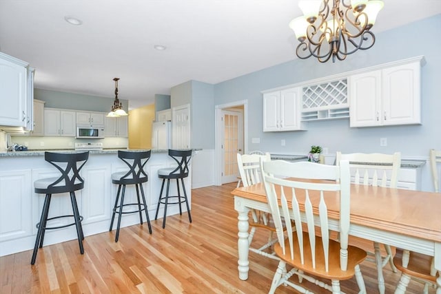 17 Stable Way, Medway, MA 02053 - dining room featuring a chandelier and light wood finished floors