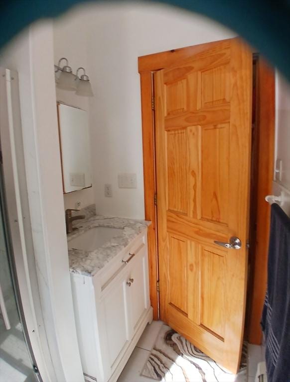 347 Summer St, Lynn, MA 01905 - bathroom featuring vanity and water heater