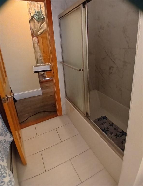 347 Summer St, Lynn, MA 01905 - bathroom with an enclosed shower and tile patterned floors