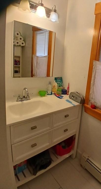 347 Summer St, Lynn, MA 01905 - bathroom with a baseboard radiator, tile patterned flooring, and vanity