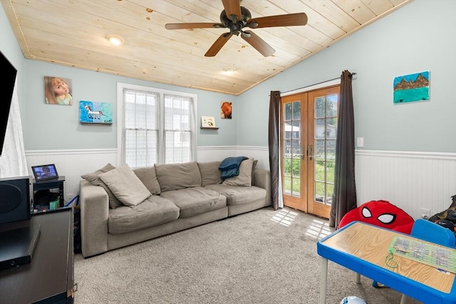 85 Flint St, Salem, MA 01970 - living room featuring wooden ceiling, a wainscoted wall, french doors, healthy amount of natural light, and a ceiling fan