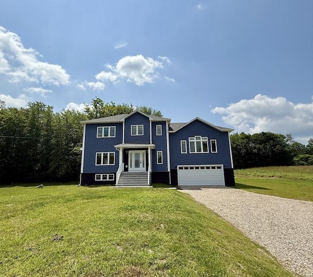 101 N Rd, Westfield, MA 01085 - view of front of property featuring gravel driveway, a garage, and a front lawn