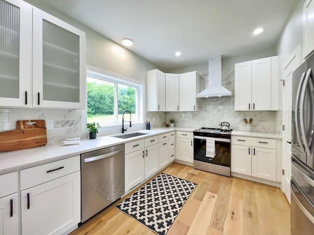 101 N Rd, Westfield, MA 01085 - kitchen with stainless steel appliances, custom exhaust hood, decorative backsplash, white cabinets, and recessed lighting