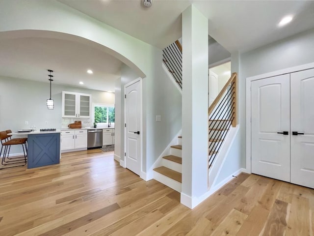 101 N Rd, Westfield, MA 01085 - staircase featuring arched walkways, wood finished floors, and recessed lighting