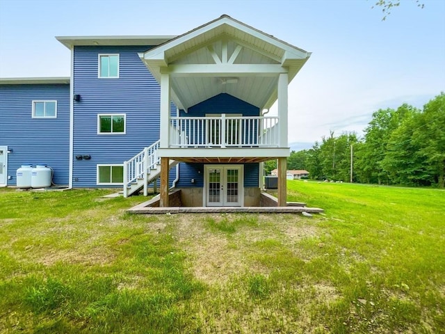101 N Rd, Westfield, MA 01085 - rear view of house featuring french doors, a yard, and a deck