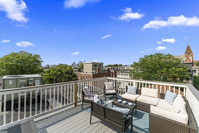 10 Mitchell St Unit 3, Boston, MA 02127 - wooden deck featuring outdoor lounge area