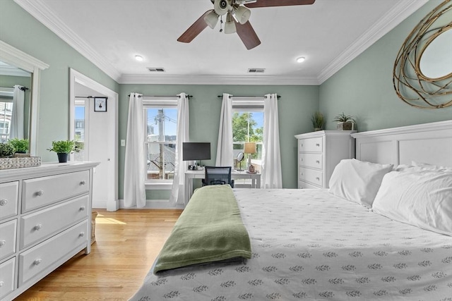 10 Mitchell St Unit 3, Boston, MA 02127 - bedroom with light wood-style flooring, ornamental molding, and ceiling fan