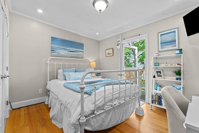 10 Mitchell St Unit 3, Boston, MA 02127 - bedroom with wood finished floors, crown molding, and recessed lighting