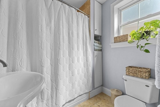 10 Mitchell St Unit 3, Boston, MA 02127 - full bathroom featuring a sink and a shower with shower curtain