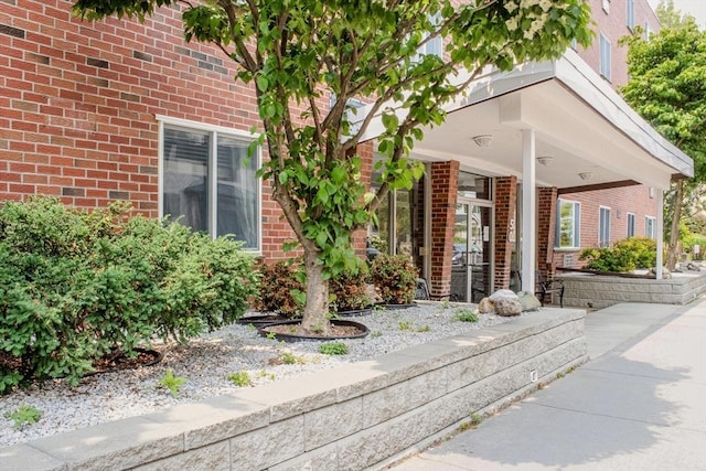 50 Green St Unit 312, Brookline, MA 02446 - property entrance with brick siding