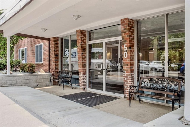 50 Green St Unit 312, Brookline, MA 02446 - view of exterior entry with brick siding