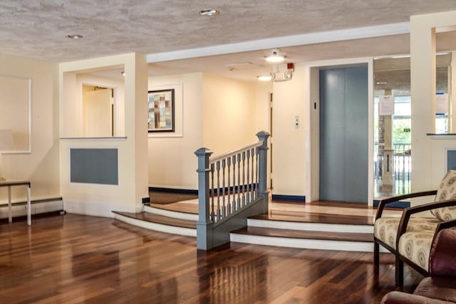 50 Green St Unit 312, Brookline, MA 02446 - interior space with wood finished floors and a baseboard radiator