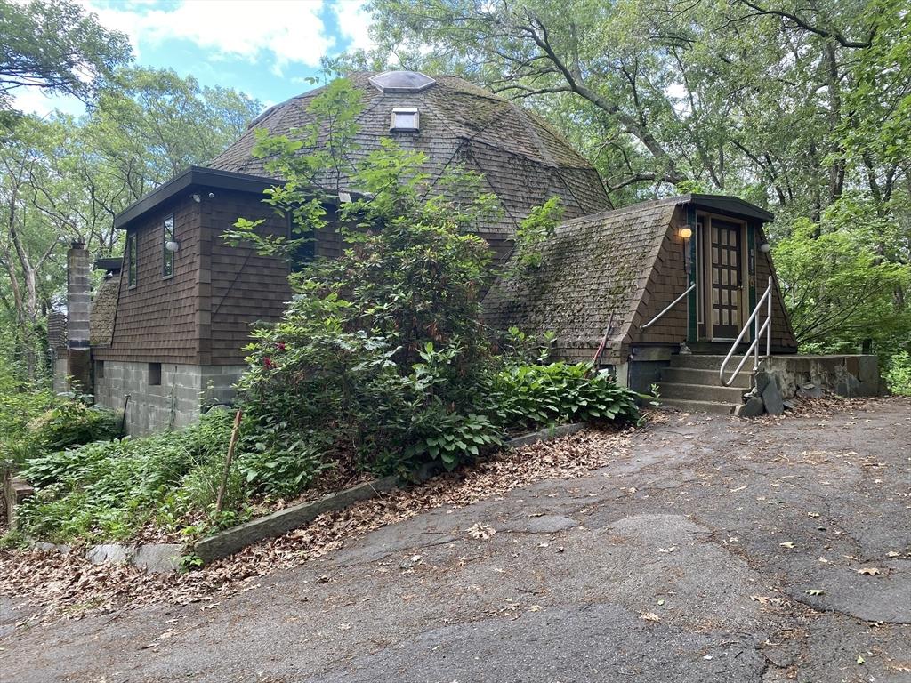 58 Concord Rd, Marlborough, MA 01752 - view of side of property with a gambrel roof, entry steps, and a chimney