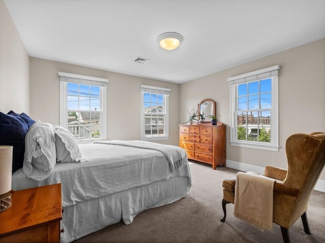 23 Chandler St, Newton, MA 02458 - carpeted bedroom featuring baseboards