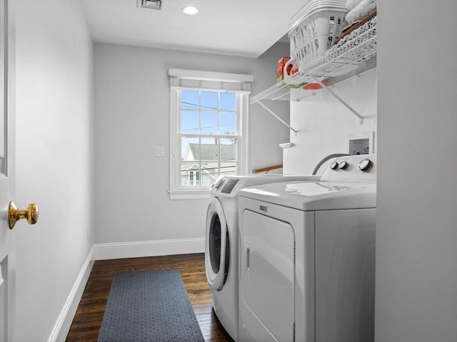 23 Chandler St, Newton, MA 02458 - laundry room with separate washer and dryer, wood finished floors, baseboards, and recessed lighting