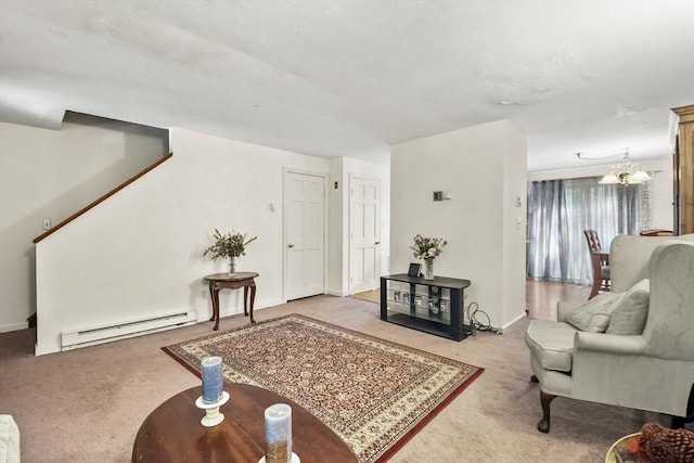 carpeted living area featuring a baseboard heating unit and an inviting chandelier