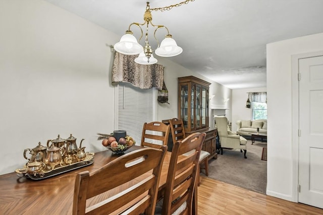 dining room with light wood-type flooring