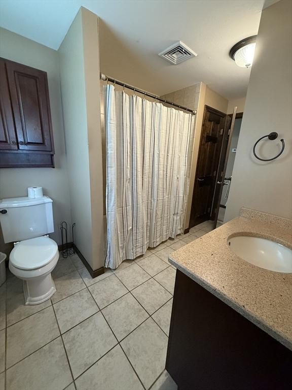69 Hickory Dr, Raynham, MA 02767 - bathroom with vanity, tile patterned floors, and curtained shower