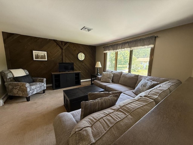 69 Hickory Dr, Raynham, MA 02767 - living room featuring carpet floors, wood walls, and a baseboard heating unit