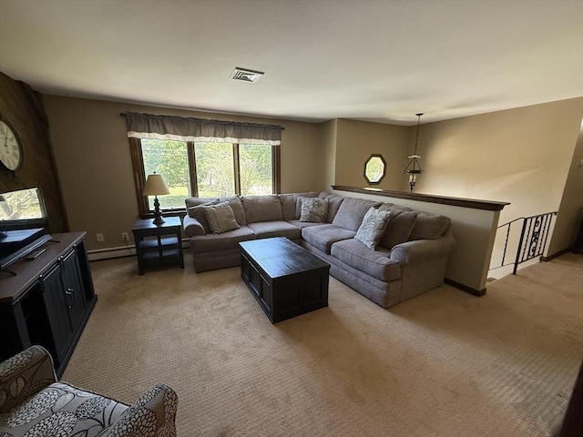 69 Hickory Dr, Raynham, MA 02767 - living room with healthy amount of natural light, light carpet, and baseboard heating