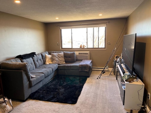36 Bayview Ter Unit 11, Danvers, MA 01923 - living room featuring carpet floors, a textured ceiling, a wall unit AC, recessed lighting, and baseboard heating