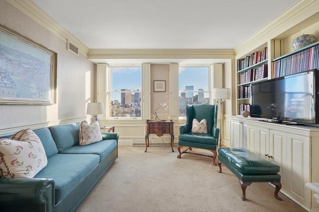 sitting room with crown molding, a wealth of natural light, and light colored carpet