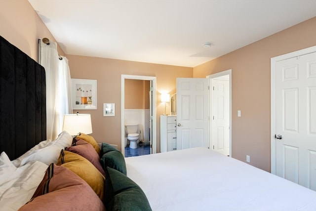 bedroom featuring connected bathroom