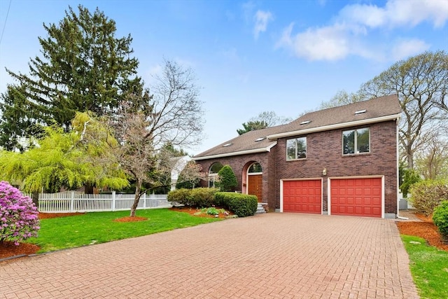 view of front of home featuring fence, brick siding, a garage, a front yard, and decorative driveway