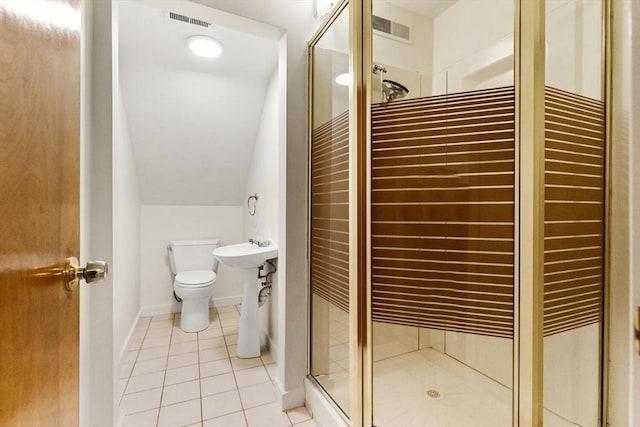 bathroom with toilet, visible vents, a shower stall, and tile patterned flooring