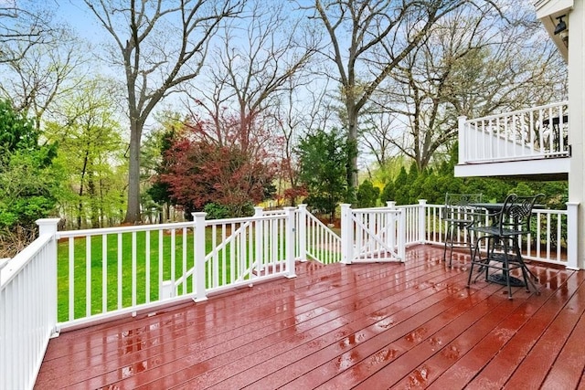 wooden deck with a yard