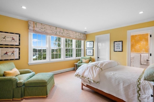 carpeted bedroom with baseboards, ensuite bath, recessed lighting, and ornamental molding