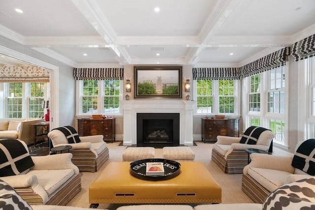 interior space with a healthy amount of sunlight, coffered ceiling, and beam ceiling