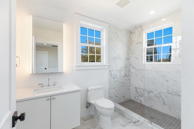 6 Mariner Way, Nantucket, MA 02564 - full bath with vanity, toilet, marble finish floor, visible vents, and tiled shower
