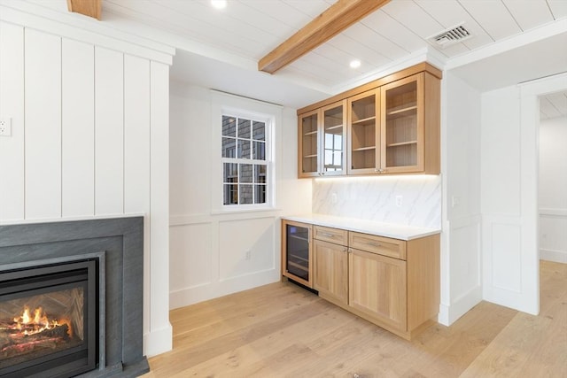 6 Mariner Way, Nantucket, MA 02564 - bar featuring beamed ceiling, a decorative wall, light wood-style flooring, and visible vents
