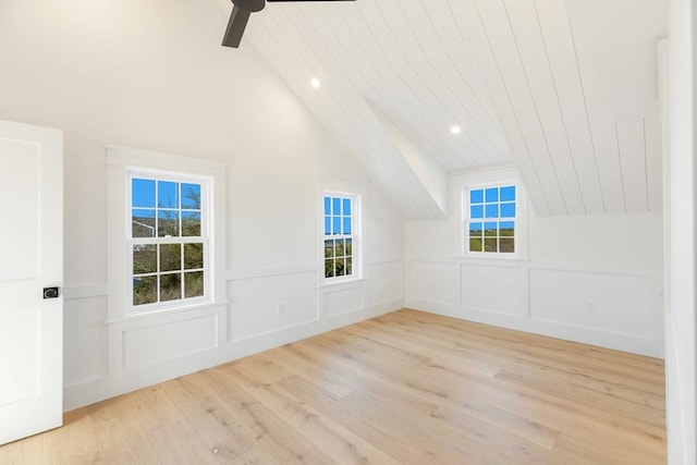 6 Mariner Way, Nantucket, MA 02564 - additional living space featuring lofted ceiling with beams, wood finished floors, and a decorative wall