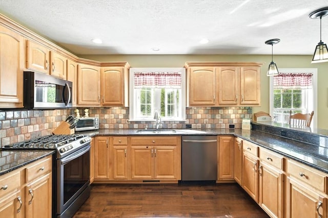 8 Pheasant Run, Belchertown, MA 01007 - kitchen featuring appliances with stainless steel finishes, a sink, healthy amount of natural light, dark wood-type flooring, and recessed lighting