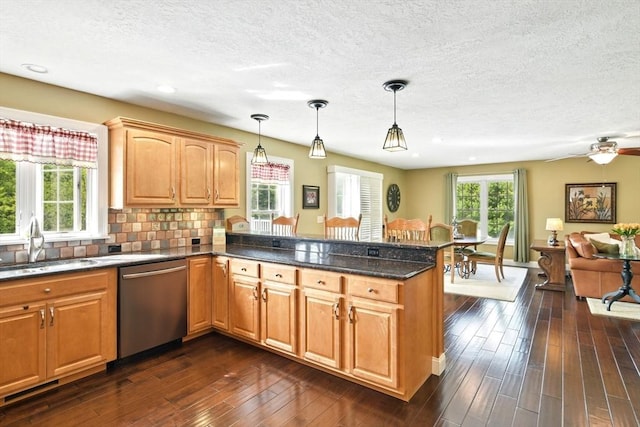 8 Pheasant Run, Belchertown, MA 01007 - kitchen with dishwasher, a peninsula, a sink, a textured ceiling, and hanging light fixtures