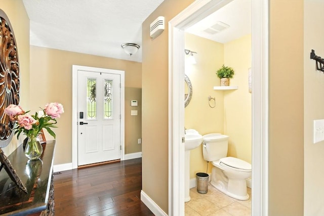 8 Pheasant Run, Belchertown, MA 01007 - bathroom with toilet, hardwood / wood-style flooring, and baseboards