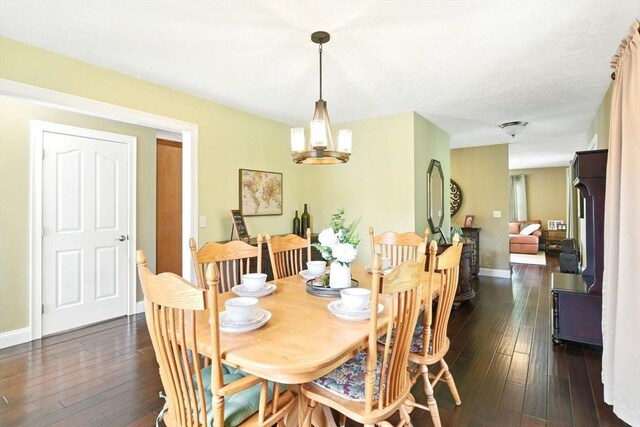 8 Pheasant Run, Belchertown, MA 01007 - dining room with dark wood-style flooring, a chandelier, and baseboards