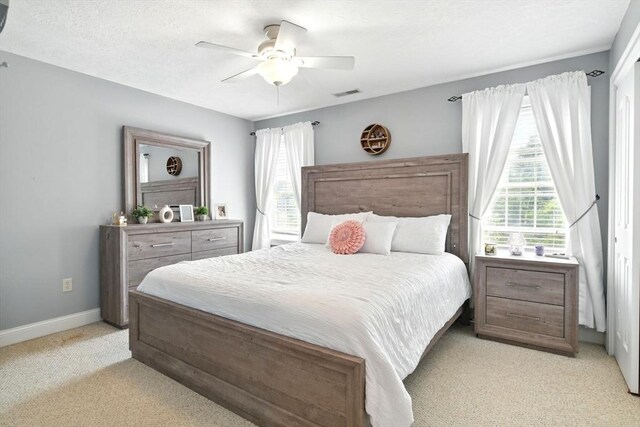 8 Pheasant Run, Belchertown, MA 01007 - bedroom featuring light colored carpet, multiple windows, a ceiling fan, and baseboards