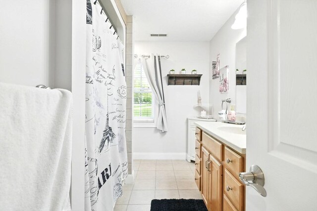 8 Pheasant Run, Belchertown, MA 01007 - full bathroom featuring tile patterned floors, vanity, baseboards, and curtained shower