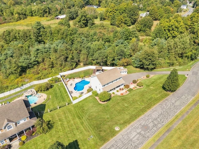 8 Pheasant Run, Belchertown, MA 01007 - bird's eye view of a pool and a heavily wooded area