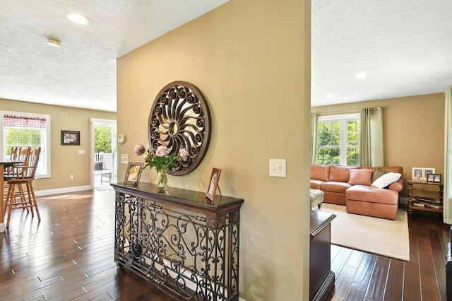 8 Pheasant Run, Belchertown, MA 01007 - corridor featuring a textured ceiling, dark wood-style floors, baseboards, and recessed lighting