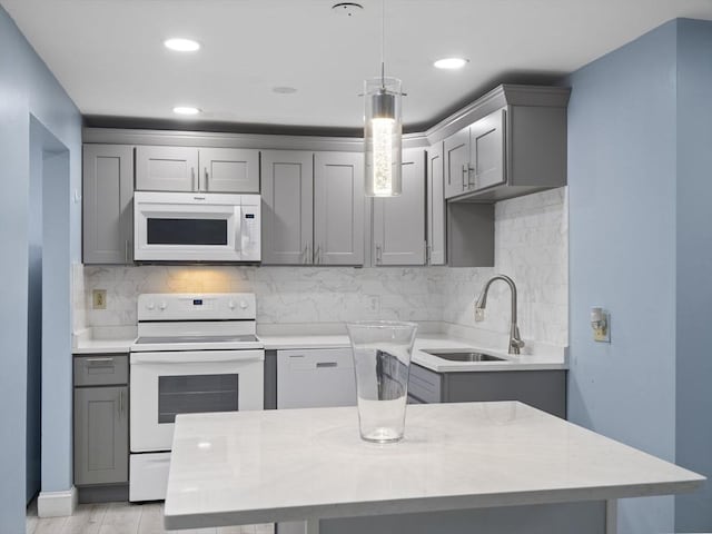 24 Bettys Pond Rd Unit K, Barnstable, MA 02601 - kitchen with white appliances, gray cabinetry, a sink, and recessed lighting