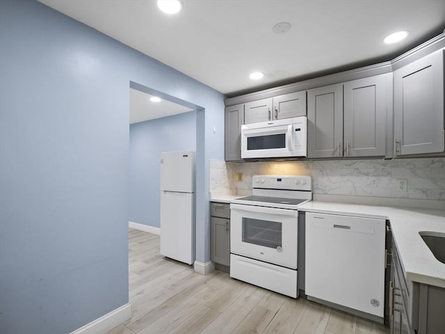 24 Bettys Pond Rd Unit K, Barnstable, MA 02601 - kitchen featuring white appliances, gray cabinetry, and recessed lighting